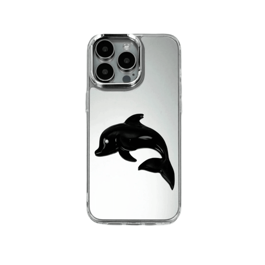 Matte phone case with a high-relief sculpted dolphin figure swimming diagonally across the back.
