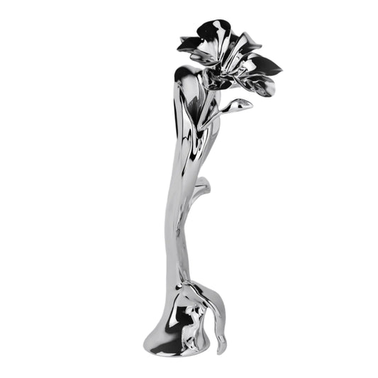 Sculptural silver vase with blooming lily design – tall, fluid chrome form evoking organic growth and contemporary floral elegance
