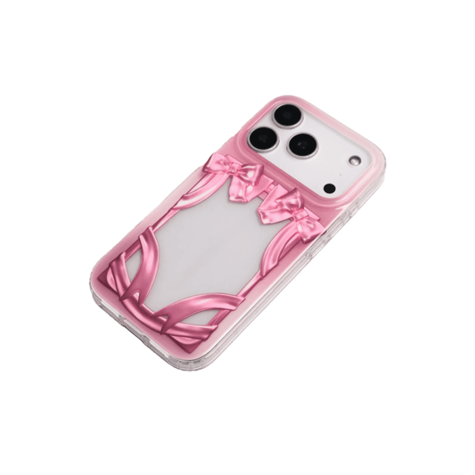 Pink IMD Bow Frame iPhone case with a clear flat window designed for inserting idol photocards or collectible cards.