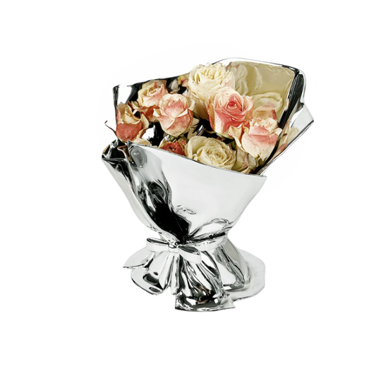 Silver flower vase with flowers on a white background