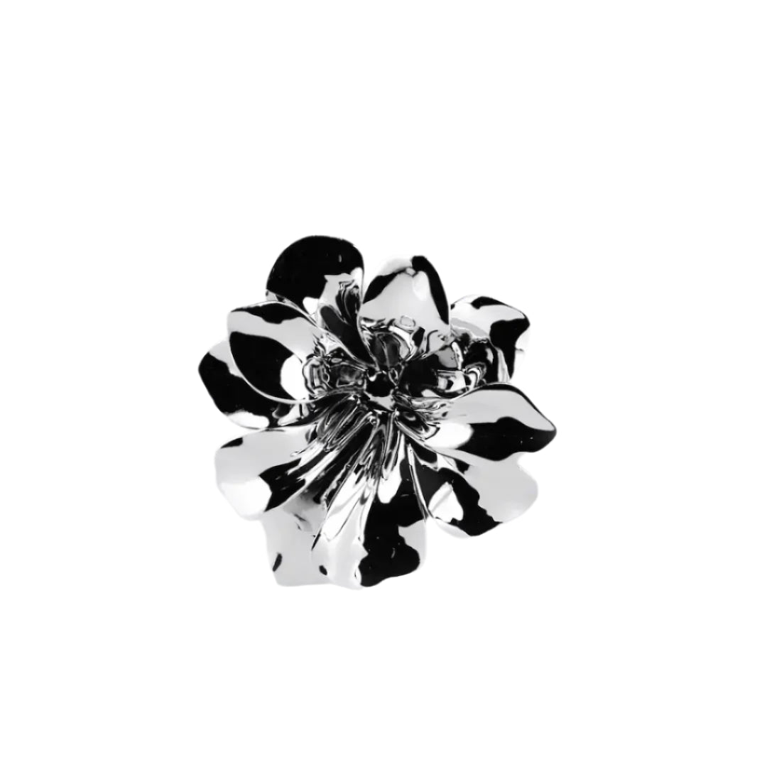 Futuristic chrome flower sculpture with fluid 3D petals – metallic botanical design in minimalist stem form