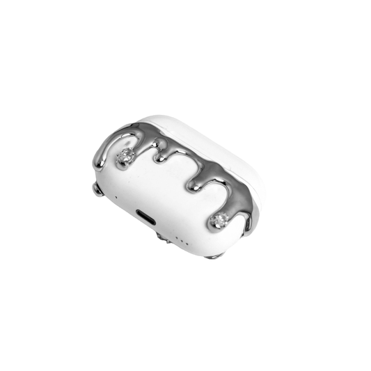 AirPods case with silver molten drip design and embedded crystals, resembling melted metal frozen mid-flow for a luxe, futuristic look.