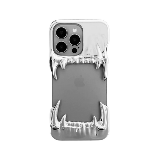 Metallic silver iPhone case with fierce dragon fang design – upper and lower jaws grip the phone edges, creating a bold, high-impact gothic aesthetic.