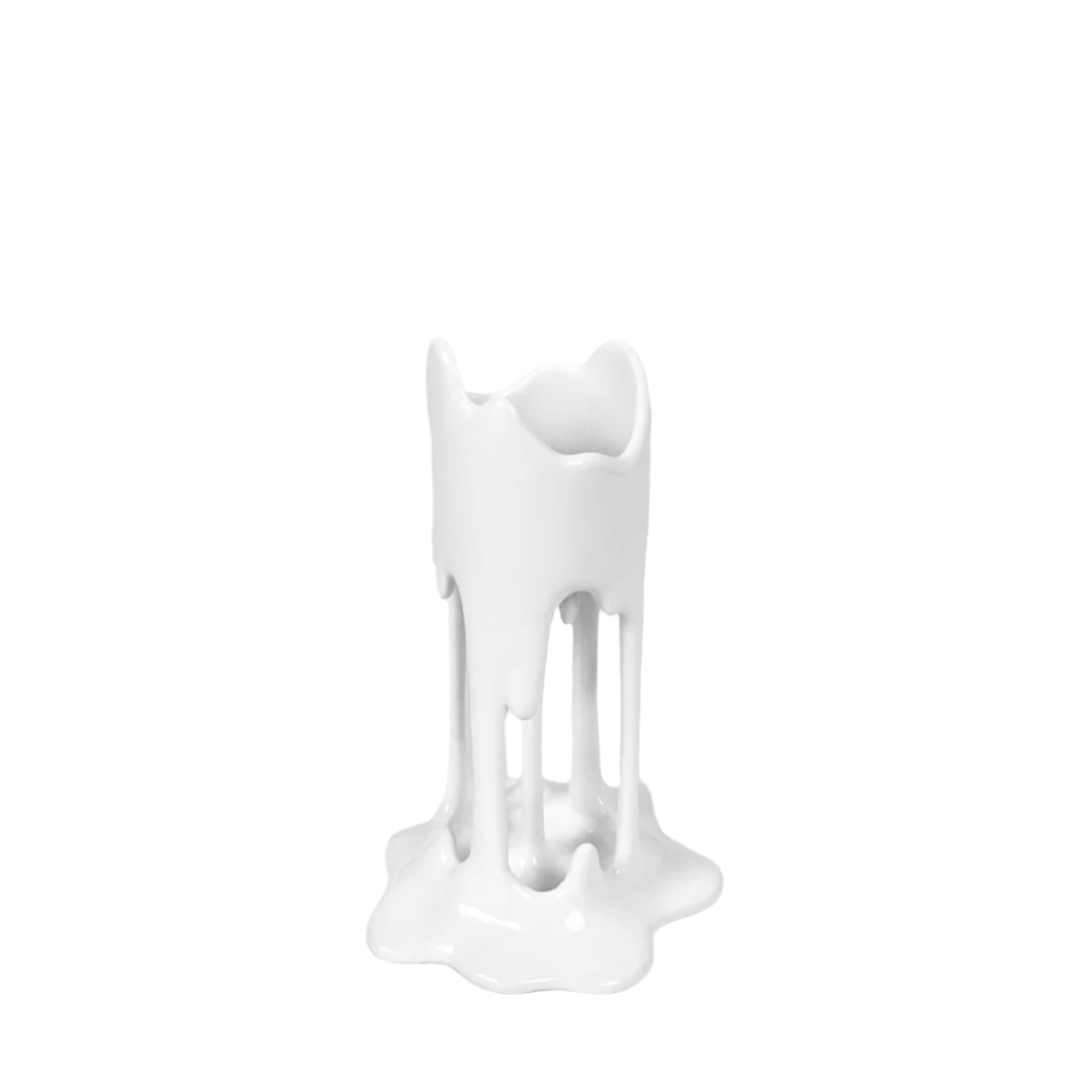 Matte-White candleholder in molten-drip form – sculptural “wax” drips pooling at the base with a hollowed top for a taper candle, featuring fluid minimalist silhouette