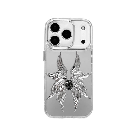 The Gem Silver Seraphim iPhone Case featuring 3D sculpted silver metallic wings with a central rhinestone. Shown with both White and Black gem options, available on Silver, Transparent, and Black case bases.