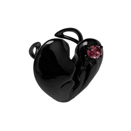 Slim band ring with a broken heart design and a pink Swarovski crystal centerpiece.