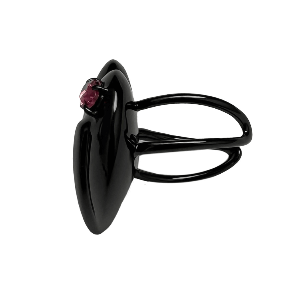 Slim band ring with a broken heart design and a pink Swarovski crystal centerpiece.