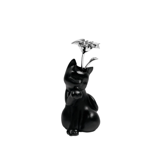 Futuristic matte-black cat vase with glossy chrome flower bloom – sleek sculptural contrast of textures in totemic lucky cat form