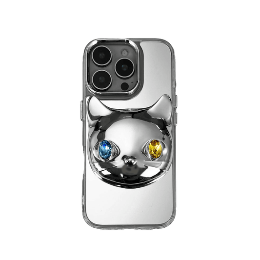 Silver mirror iPhone case with 3D cat face design, featuring mismatched gem eyes in blue and yellow — perfect for a quirky, futuristic feline aesthetic.
