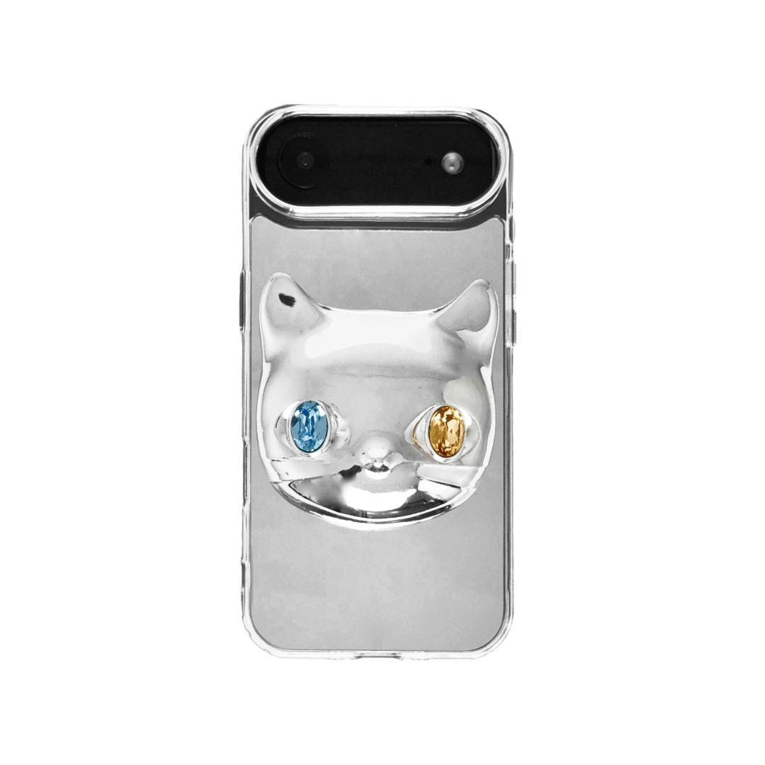 Silver mirror iPhone case with 3D cat face design, featuring mismatched gem eyes in blue and yellow — perfect for a quirky, futuristic feline aesthetic.