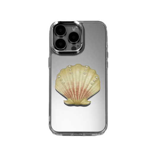 Matte phone case with a raised scallop shell design adorned with small pearl-like dots.
