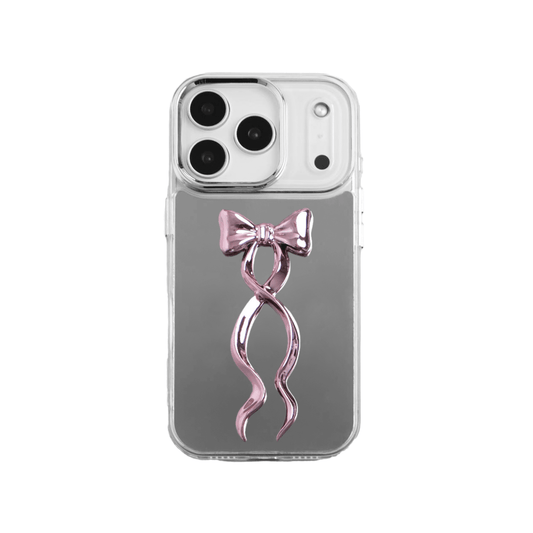 A collection of five clear or silver-based iPhone cases, each featuring a large, centered illustration of a long, stylized ribbon bow. The bows come in five colors: silver, glossy black, white, pink, and purple.