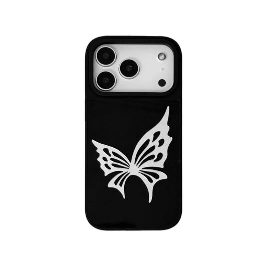 A high-fashion iPhone case featuring a large 3D butterfly ornament made of reflective silver acrylic. The design showcases intricate wing cutouts and is available in two base finishes: a Reflective Silver metallic base and a Sleek Black base, highlighting the bold, futuristic contrast of the metallic butterfly.