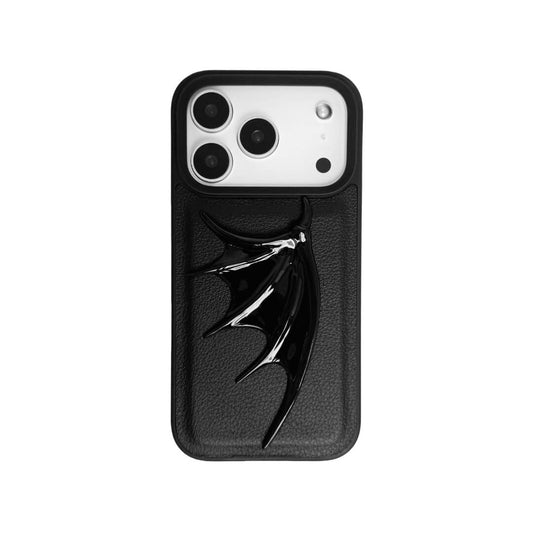 A 3D sculpted demon wing iPhone case with a raised black wing design, shown in both a transparent version and a black leather-textured version.