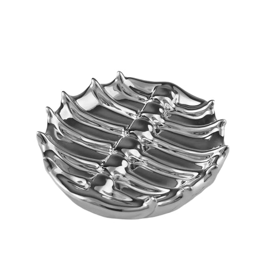 Futuristic chrome tray with 3D sculptural ribcage design – metallic anatomical totem-style centerpiece