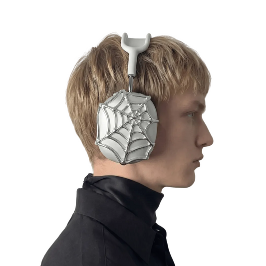 Intricate silver spider web design cover for AirPods Max, made from eco-friendly SLA material, gothic aesthetic tech accessory.
