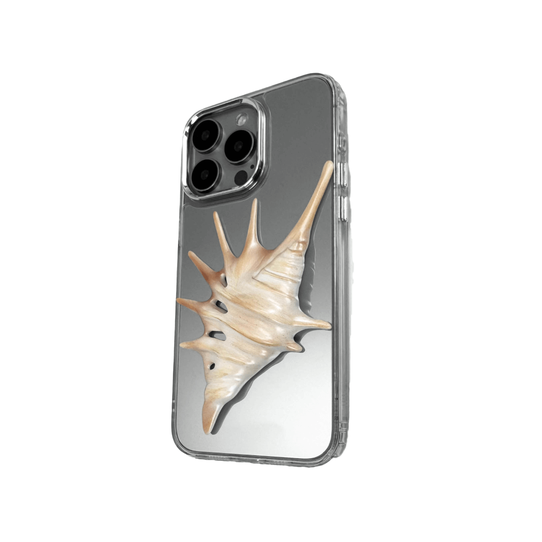 iPhone case featuring a dramatic metallic seashell sculpture with elongated, spiked ridges and pearlescent highlights.