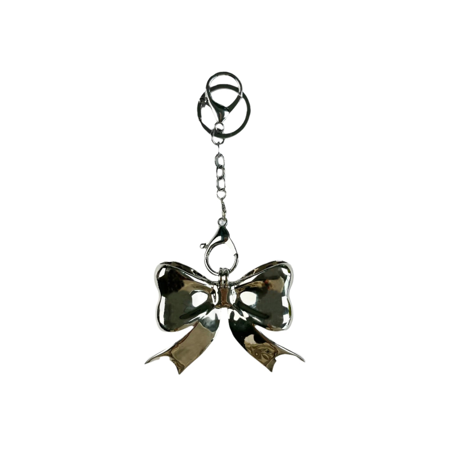 bag charm, bow, silver, xtended identity