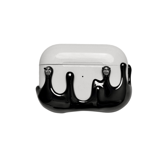 AirPods case with upward-flowing silver surge design, featuring crystal accents at the tips of molten-like peaks for a rising liquid metal effect.