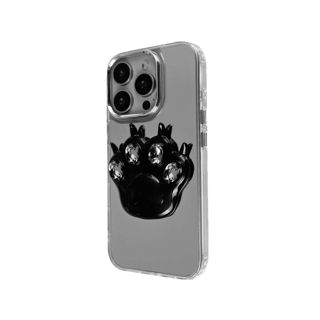 GEM CAT PAW iPhone Case with a black or silver sculpted cat paw design, set with Swarovski crystals in black, white, or pink, shown with pink crystals on a mirror-finish