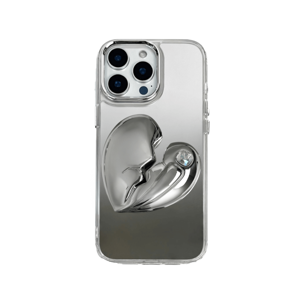 3D silver, pink, red and black metallic iPhone case featuring a cracked heart design with smooth chrome finish and a single embedded gem.