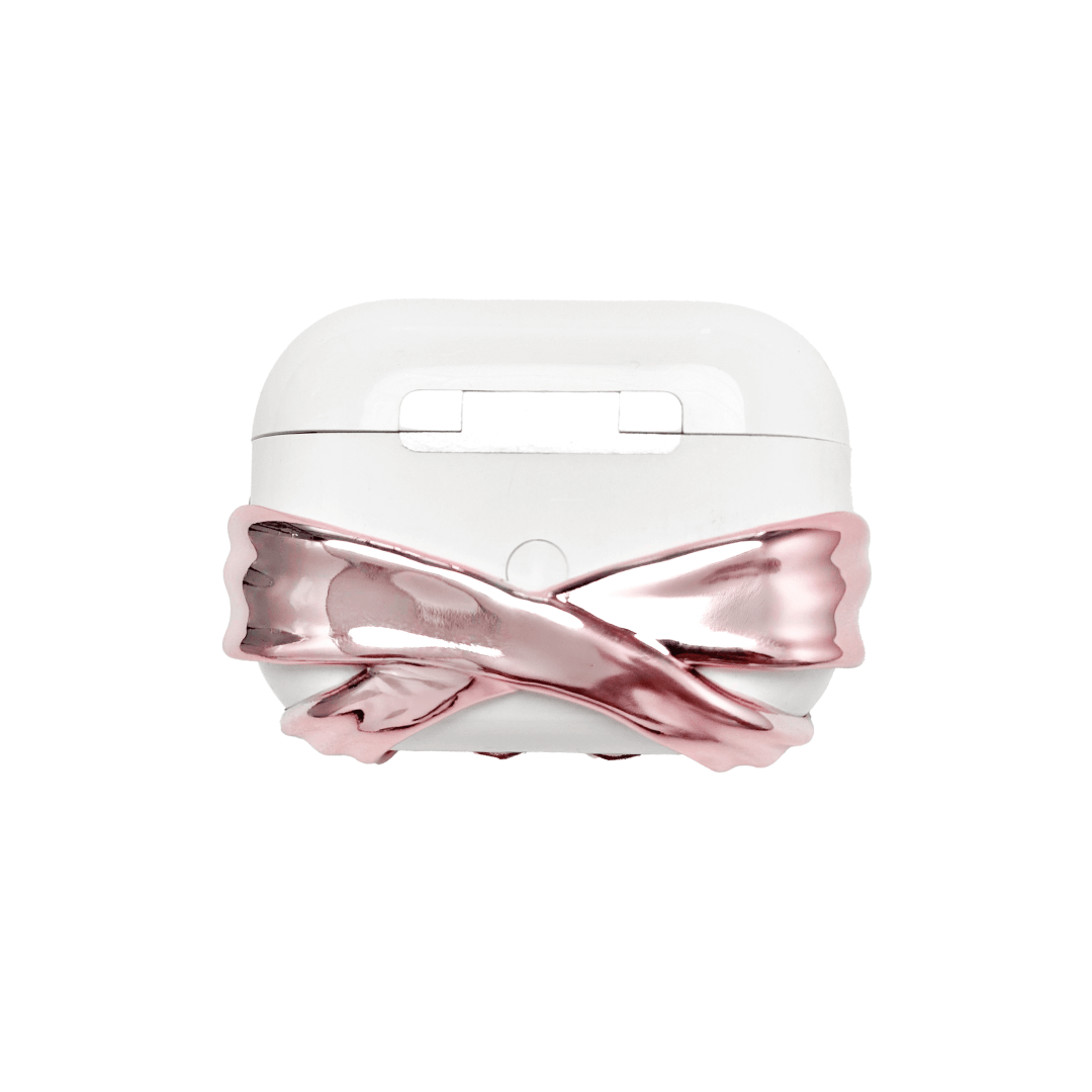AirPods case cover with a multi-petal cherry blossom design in pink or silver, featuring a sparkling pink Swarovski crystal at the flower’s center for a refined, elegant touch.
