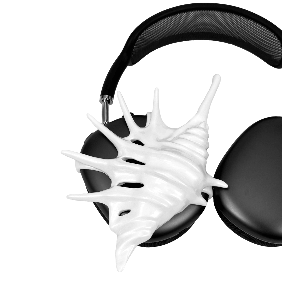 Over-ear Apple headphones adorned with spiky sculptural shells inspired by deep-sea murex forms, merging oceanic textures with bold acoustic design.