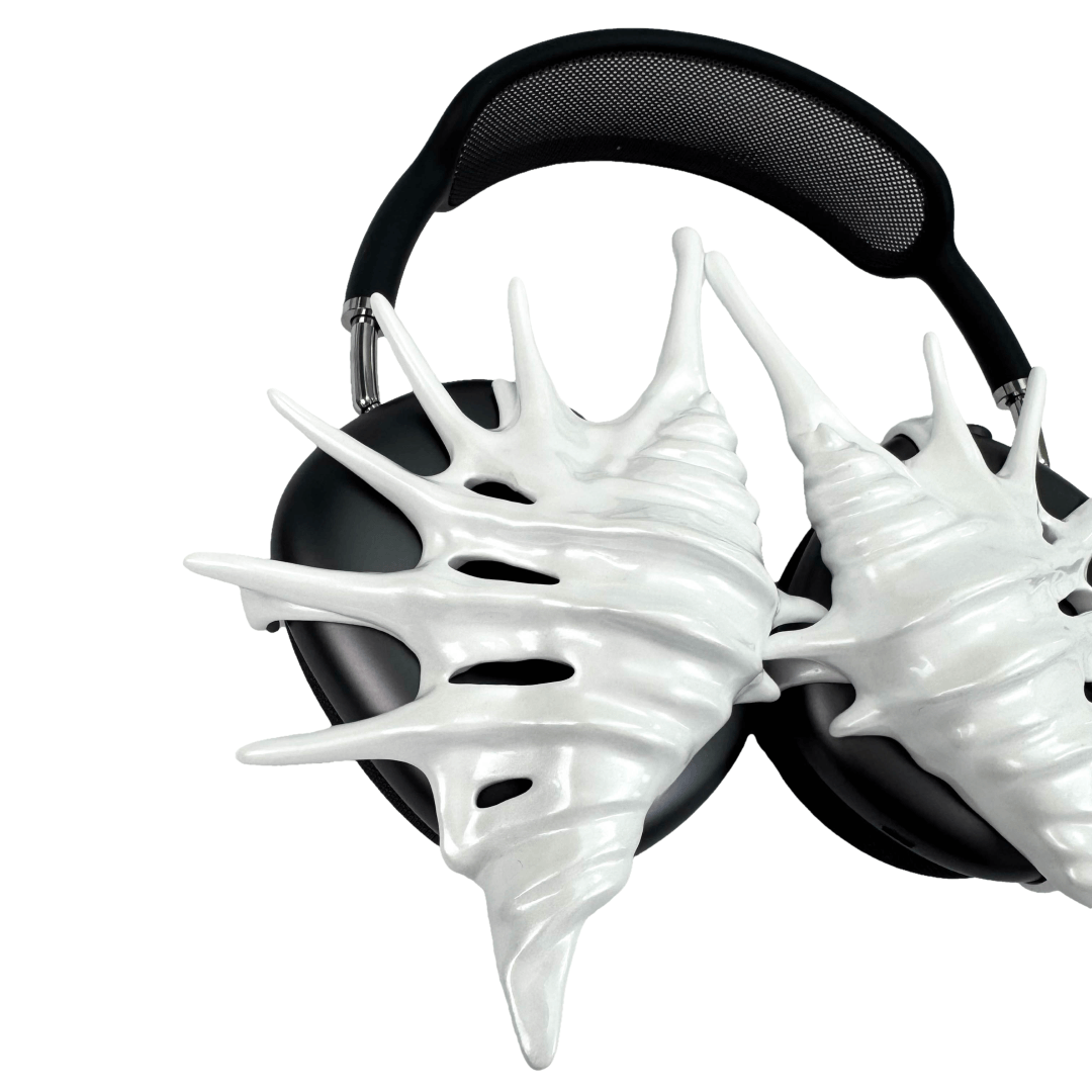 Over-ear Apple headphones adorned with spiky sculptural shells inspired by deep-sea murex forms, merging oceanic textures with bold acoustic design.
