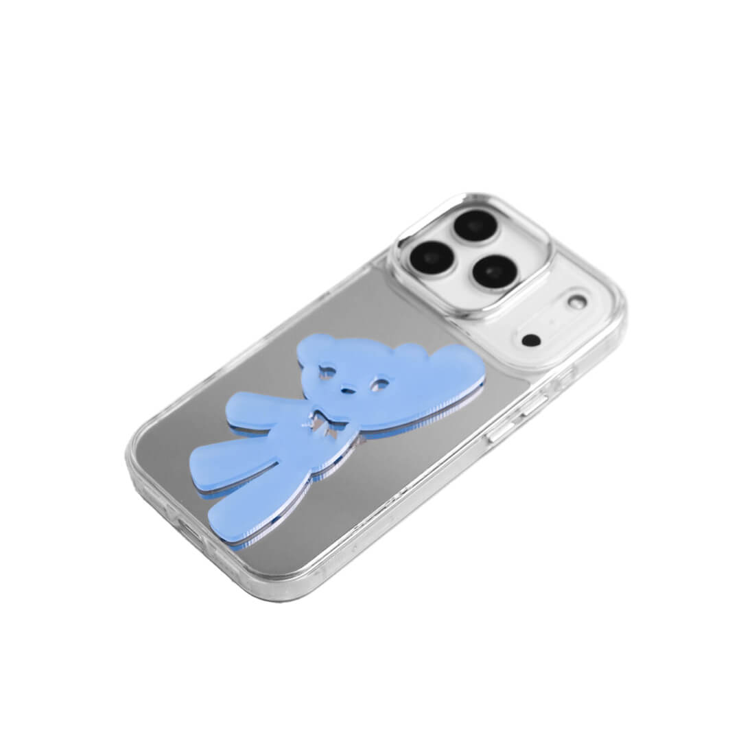 A contemporary iPhone case featuring a deconstructed 3D acrylic bear ornament with an artistic, elongated silhouette. Available in vibrant Sakura Pink and Azure Blue finishes on a Clear Transparent base, showcasing a blend of playful whimsy and modern design.