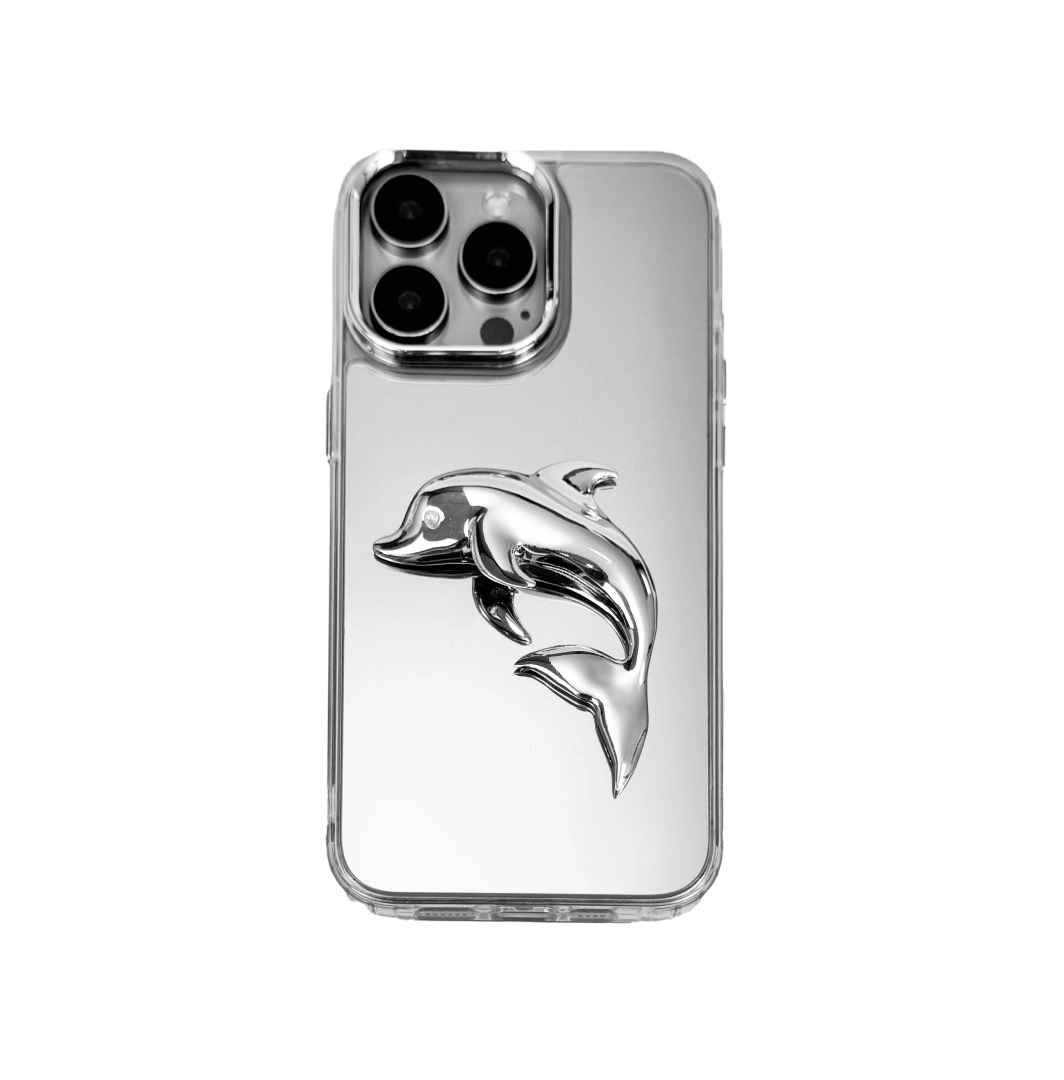 Matte phone case with a high-relief sculpted dolphin figure swimming diagonally across the back.