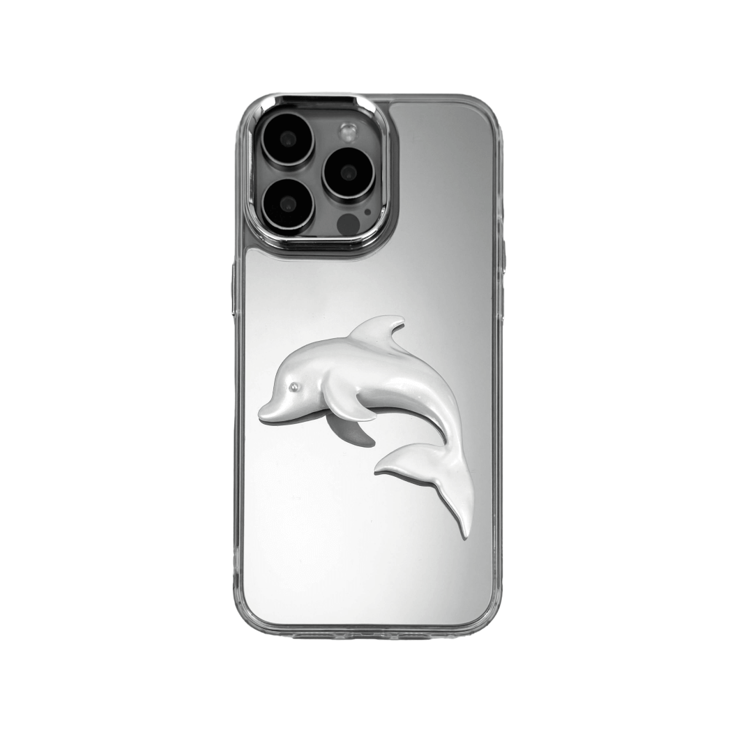 Matte phone case with a high-relief sculpted dolphin figure swimming diagonally across the back.