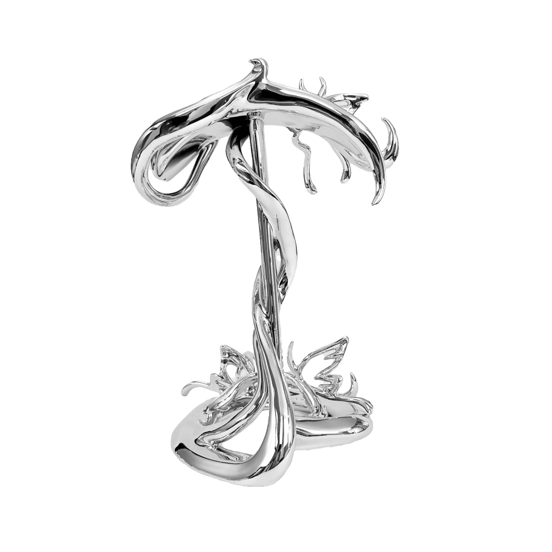 Chrome sculptural AirPods Max stand with twisted spiral base and butterfly details – luxury headphone holder