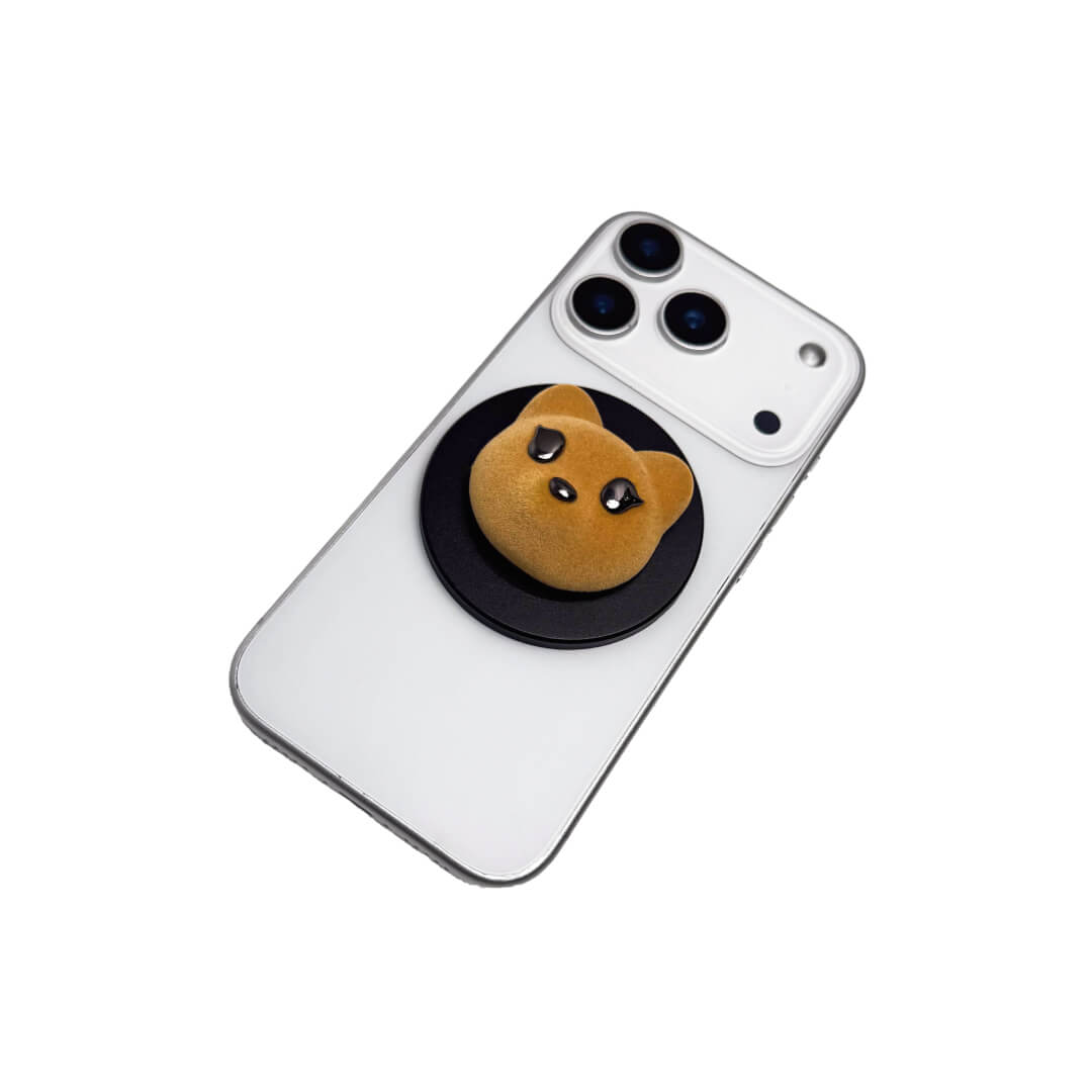 Bear Head iPhone Grip. A cute brown fluffy 3D bear head phone grip attached to the back of a white iPhone case.