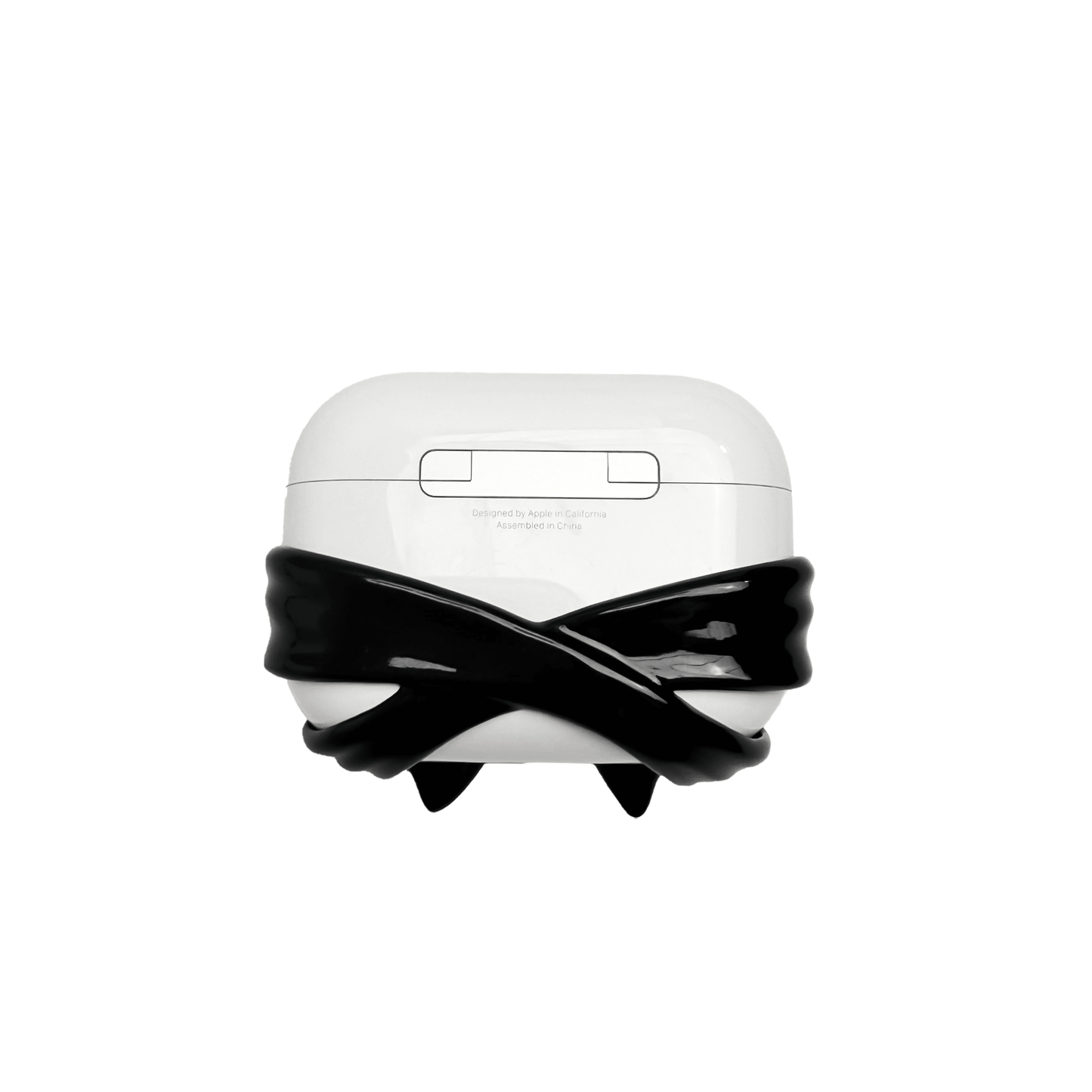 A pair of protective covers for Apple AirPods (or AirPods Pro) charging case. Each cover is white and features a large, 3D sculpted bow charm centered on the front. One bow is glossy black and the other is pure white, with a single white pearl embedded in the center of each.
