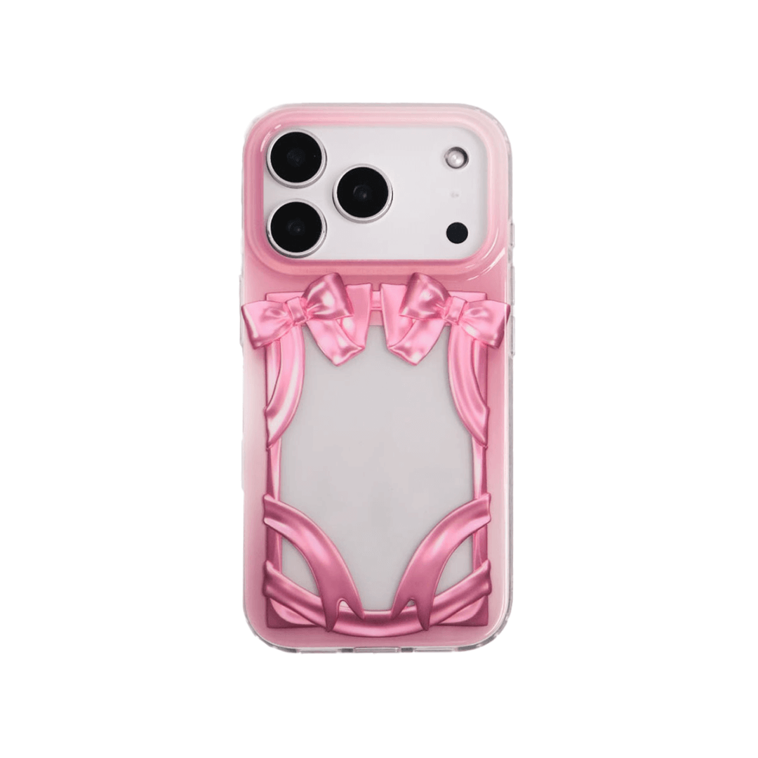 Pink IMD Bow Frame iPhone case with a clear flat window designed for inserting idol photocards or collectible cards.