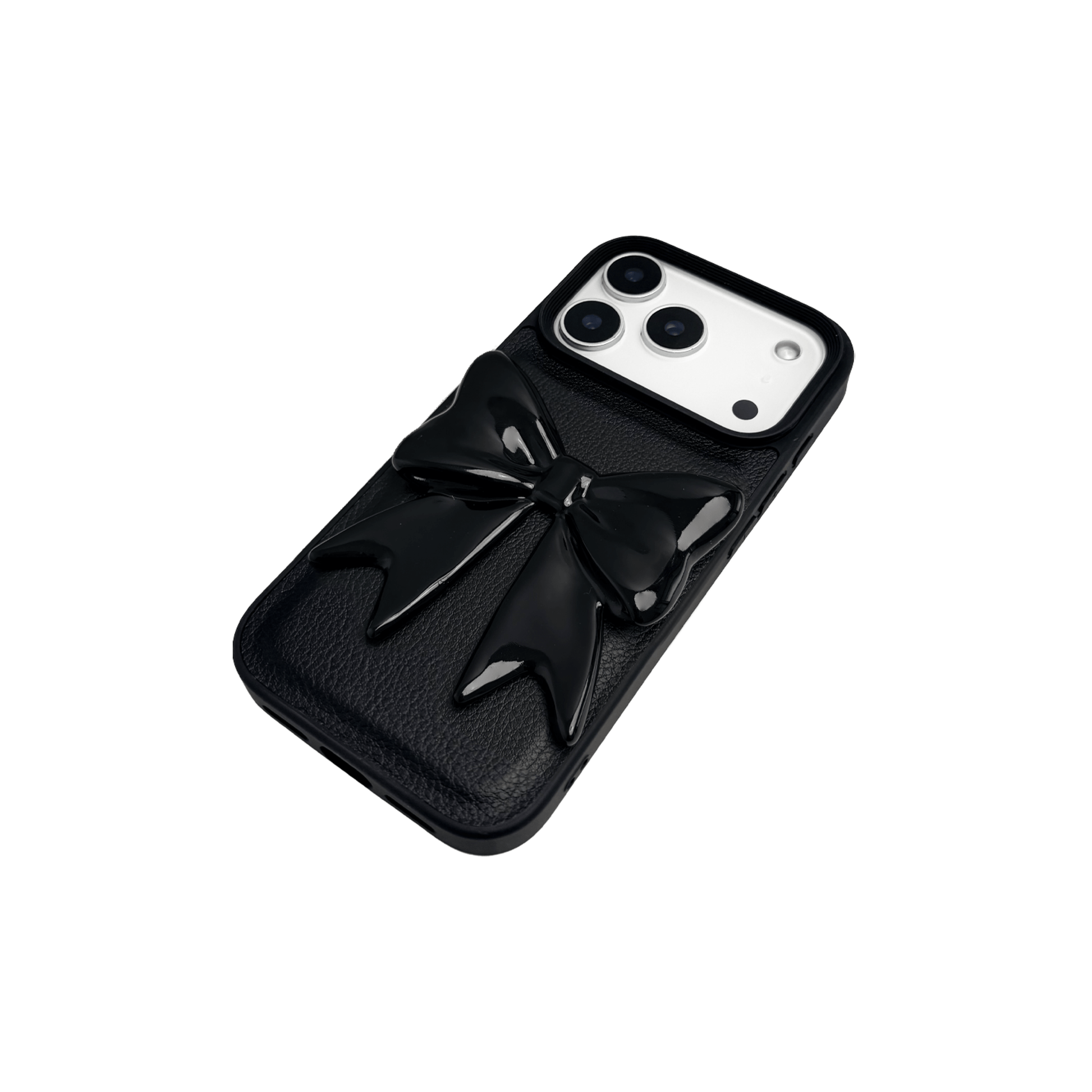 A pair of premium iPhone cases featuring a textured, high-quality leather finish. Each case has a large, centered 3D sculpted bow on the back. One case is Off-White leather with a matching bow, and the other is Black leather with a matching black bow.