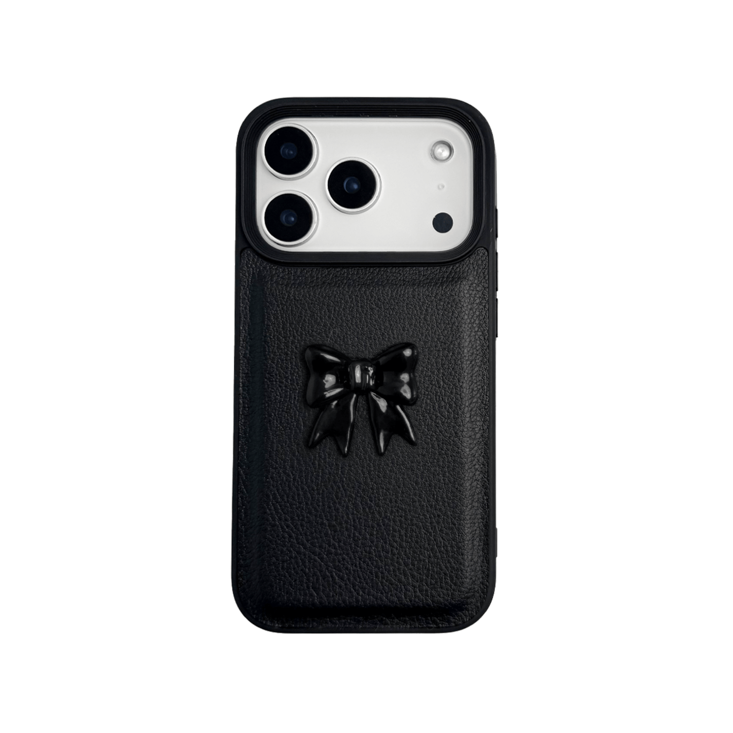 A pair of luxury iPhone cases featuring a textured, high-quality leather finish. Each case has a large, centered, 3D sculpted bow on the back. The top case is Off-White leather with a matching bow, and the bottom case is Black leather with a matching black bow.