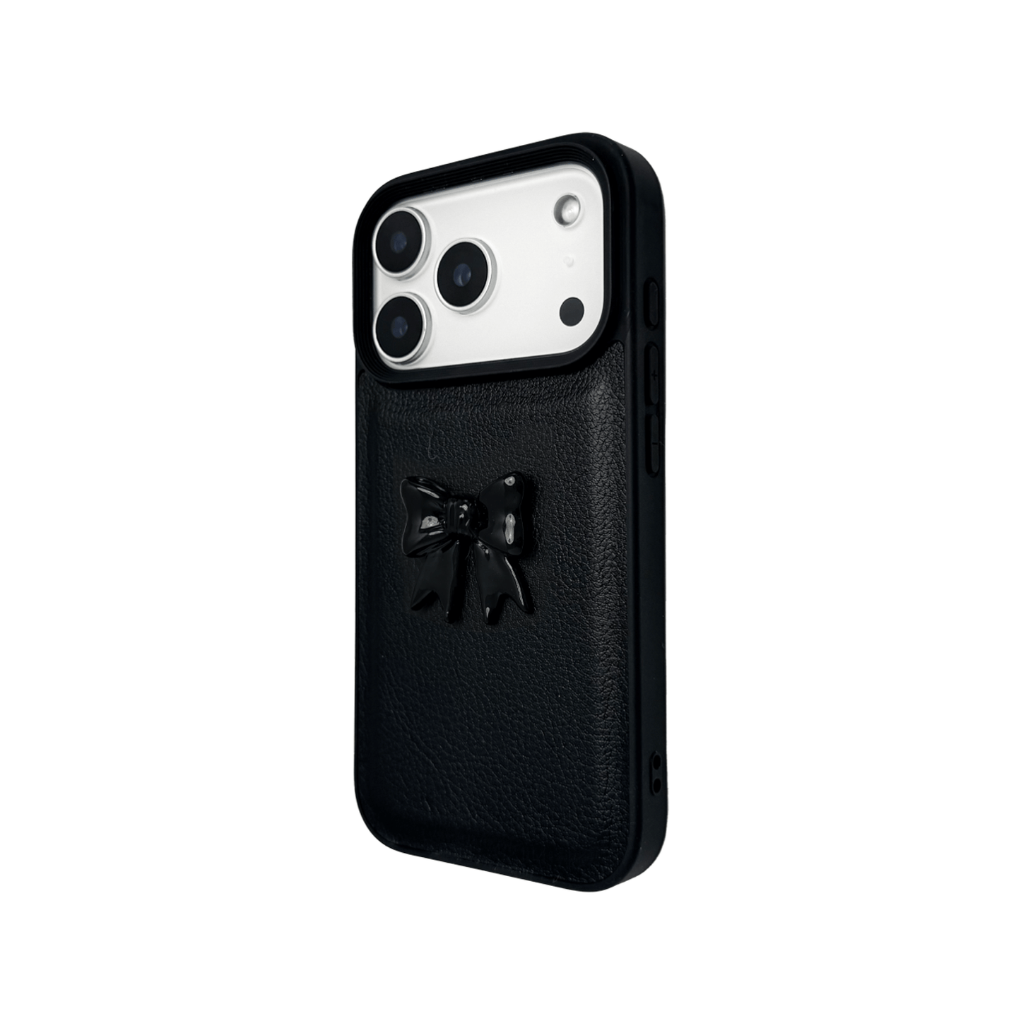 A pair of luxury iPhone cases featuring a textured, high-quality leather finish. Each case has a large, centered, 3D sculpted bow on the back. The top case is Off-White leather with a matching bow, and the bottom case is Black leather with a matching black bow.