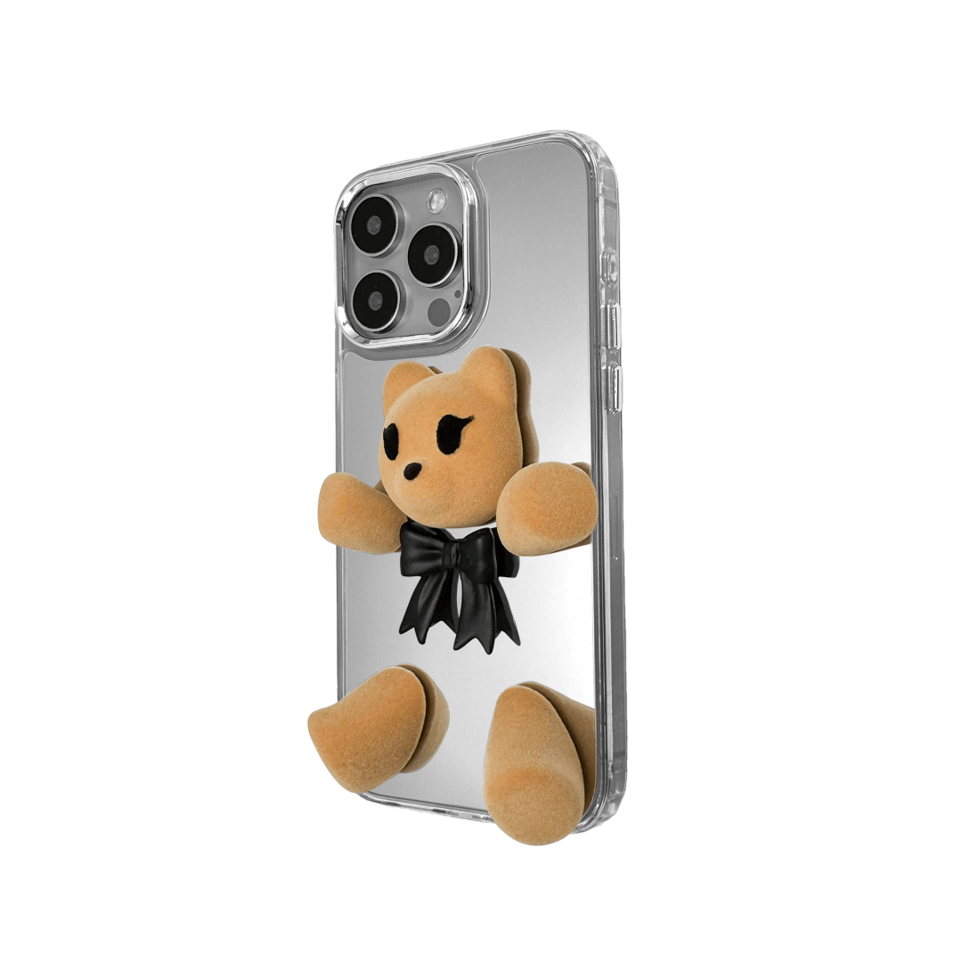 Transparent mirror phone case with a 3D teddy bear in brown flocking, wearing a black bow tie.