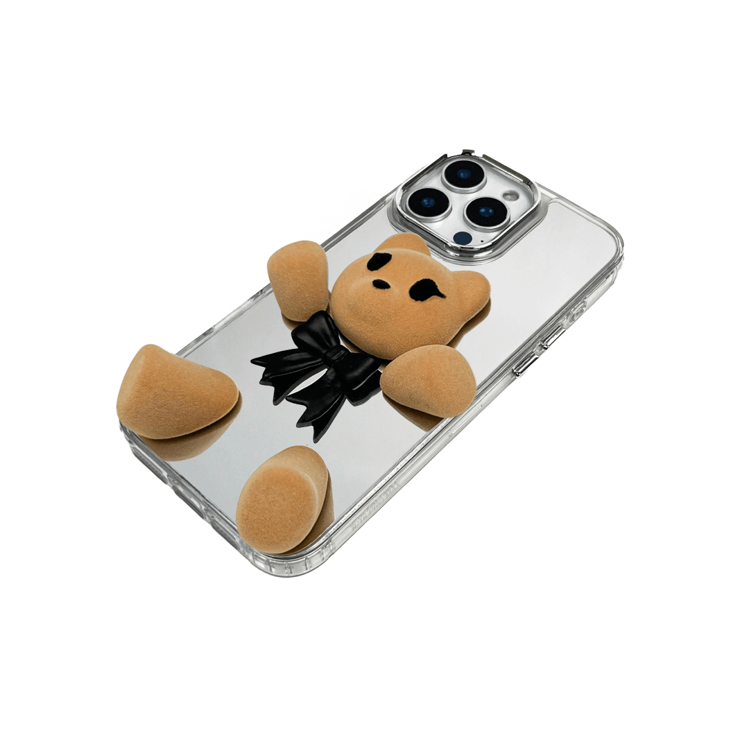 Transparent mirror phone case with a 3D teddy bear in brown flocking, wearing a black bow tie.