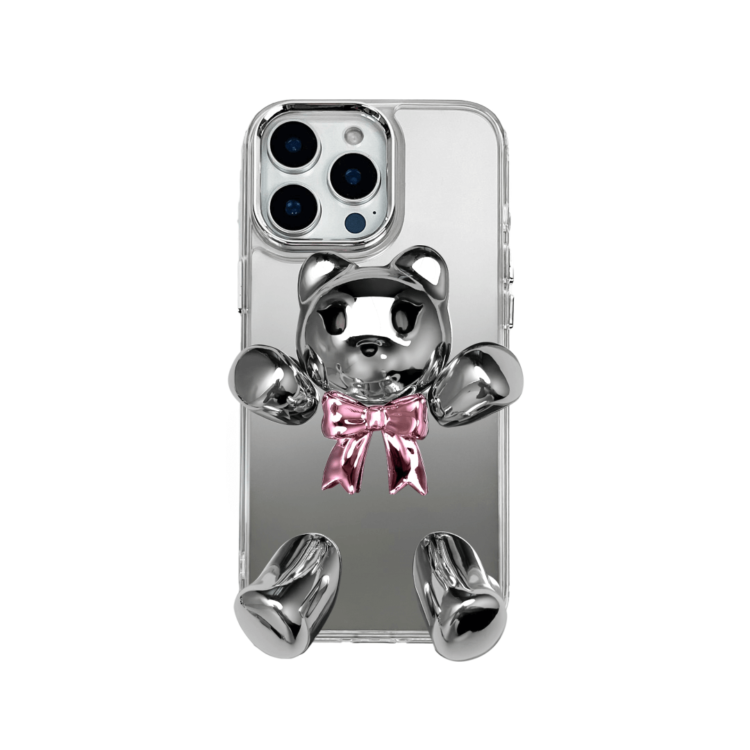 Transparent mirror phone case with a 3D teddy bear in brown flocking, wearing a black bow tie.