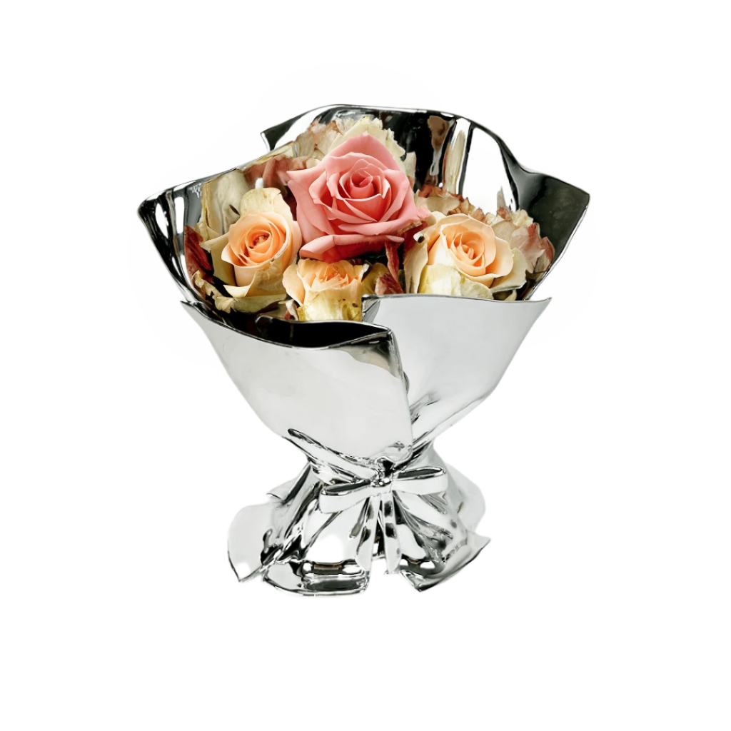 Silver bowl vase with flowers on a white background