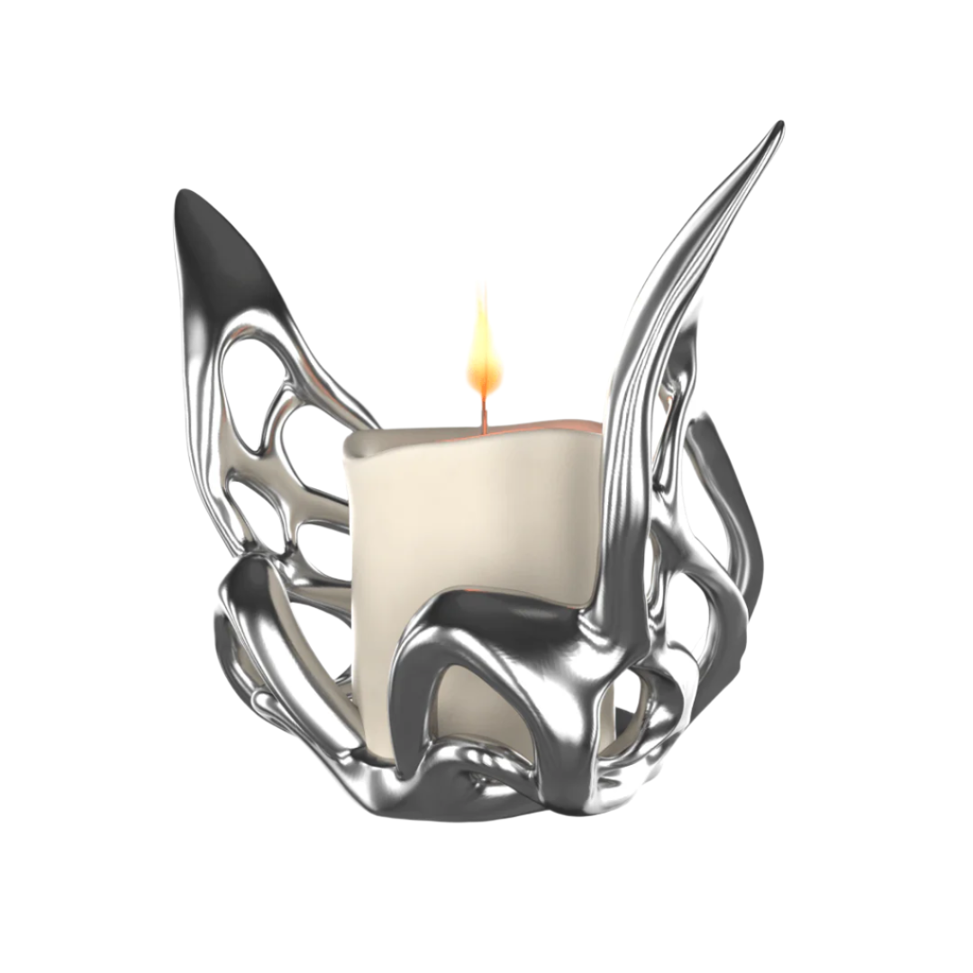 Futuristic chrome butterfly candle holder with wing-inspired curved frame – sculptural metallic design encasing a pillar candle