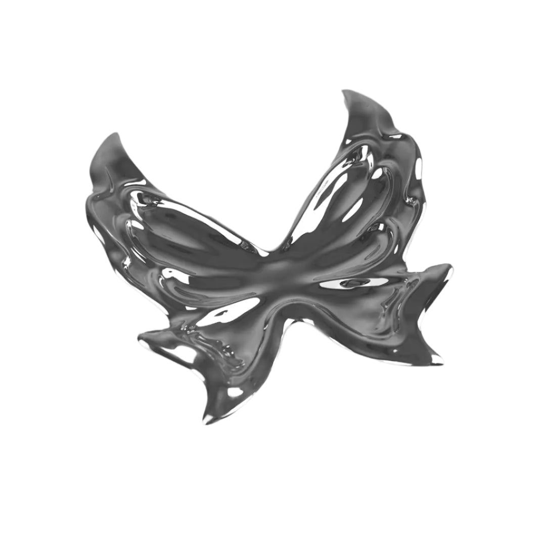 Futuristic chrome butterfly sculpture with fluid 3D wings – minimalist metal art piece featuring mirror-like surface and organic totemic form