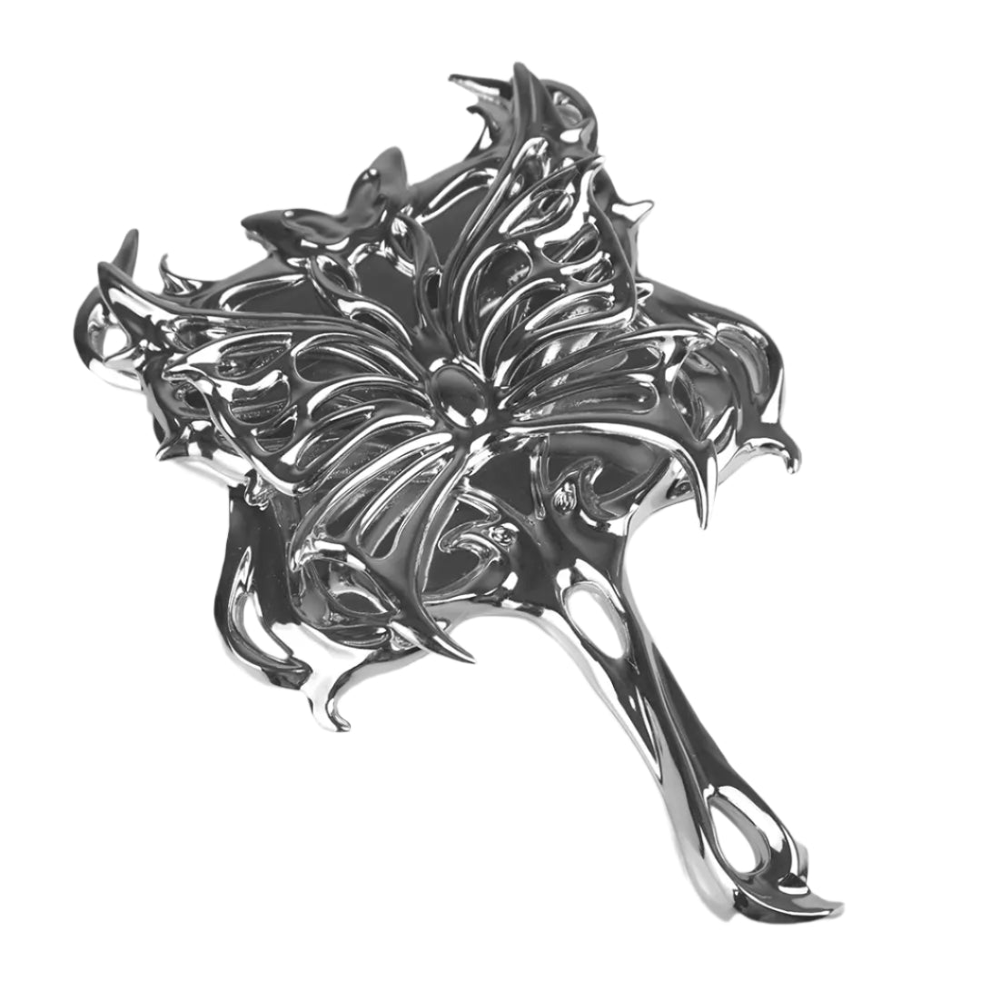 Futuristic chrome hand mirror with 3D sculptural butterfly design – metallic hollow totem-style frame