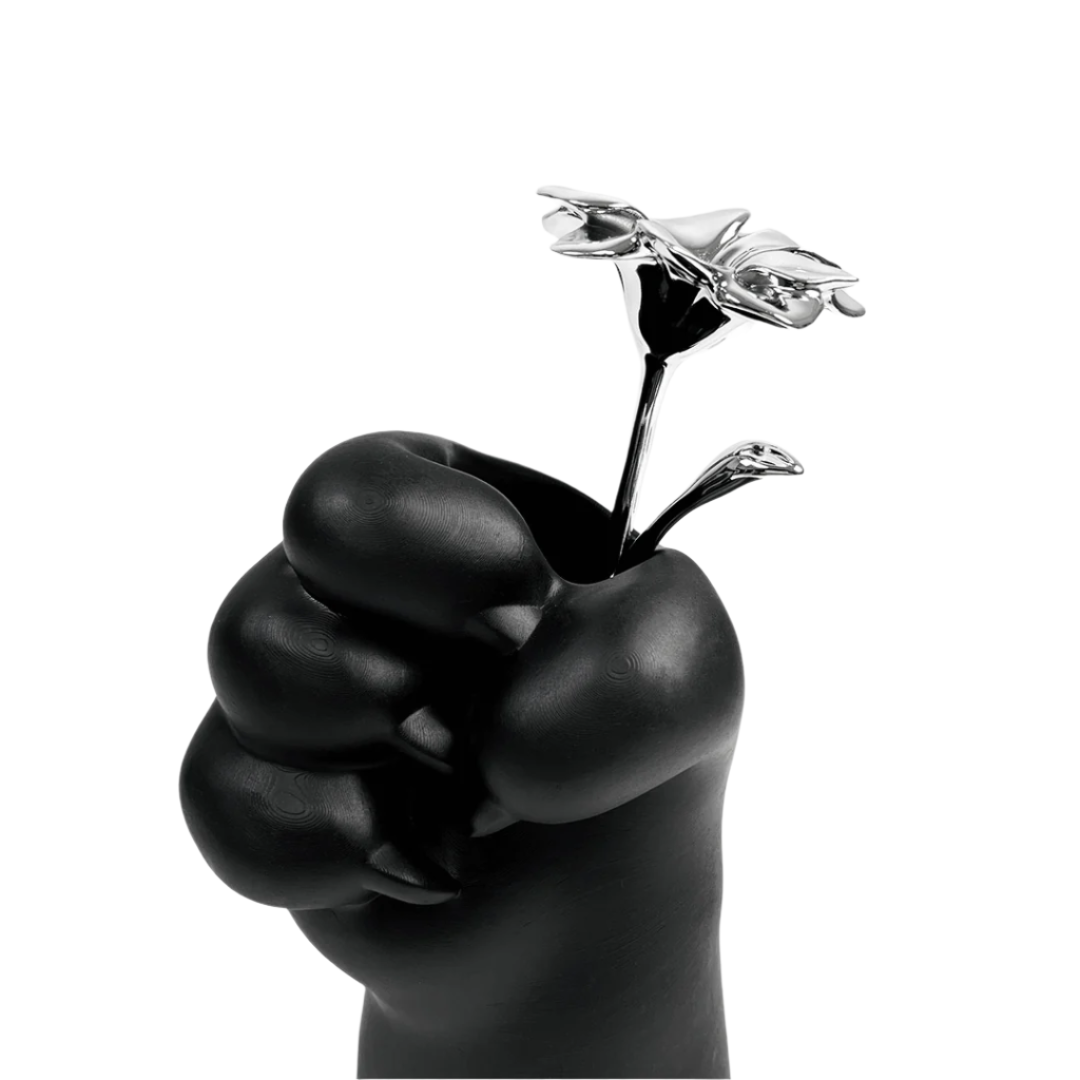 Futuristic chrome cat paw vase – sculptural paw-shaped metal vessel with smooth reflective finish, blending playful animal motif and minimalist design