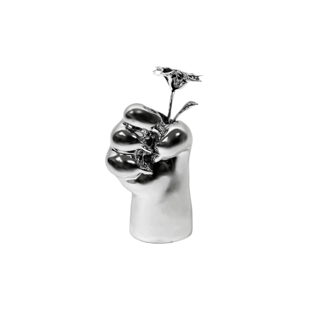 Futuristic chrome cat paw vase – sculptural paw-shaped metal vessel with smooth reflective finish, blending playful animal motif and minimalist design