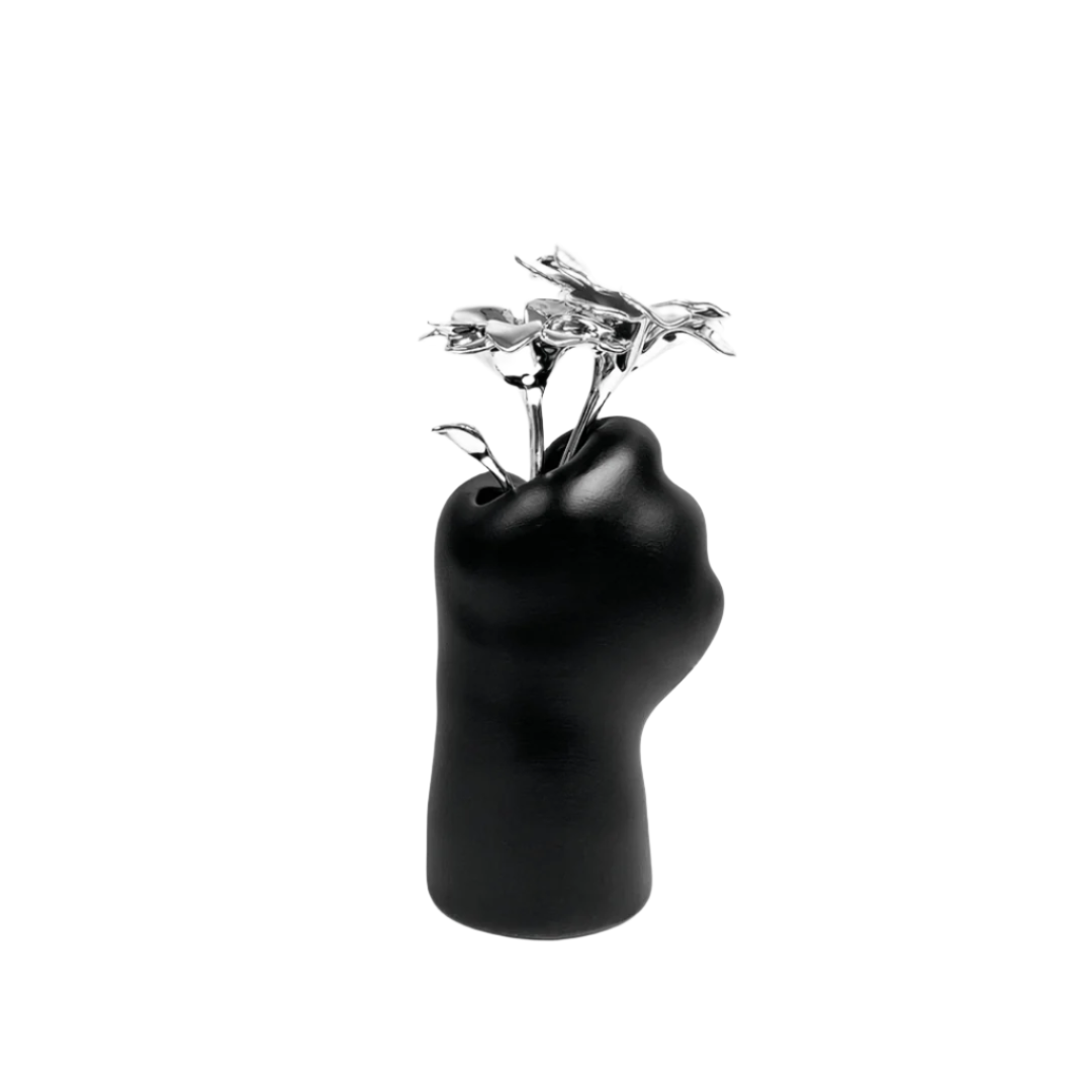 Futuristic chrome cat paw vase – sculptural paw-shaped metal vessel with smooth reflective finish, blending playful animal motif and minimalist design