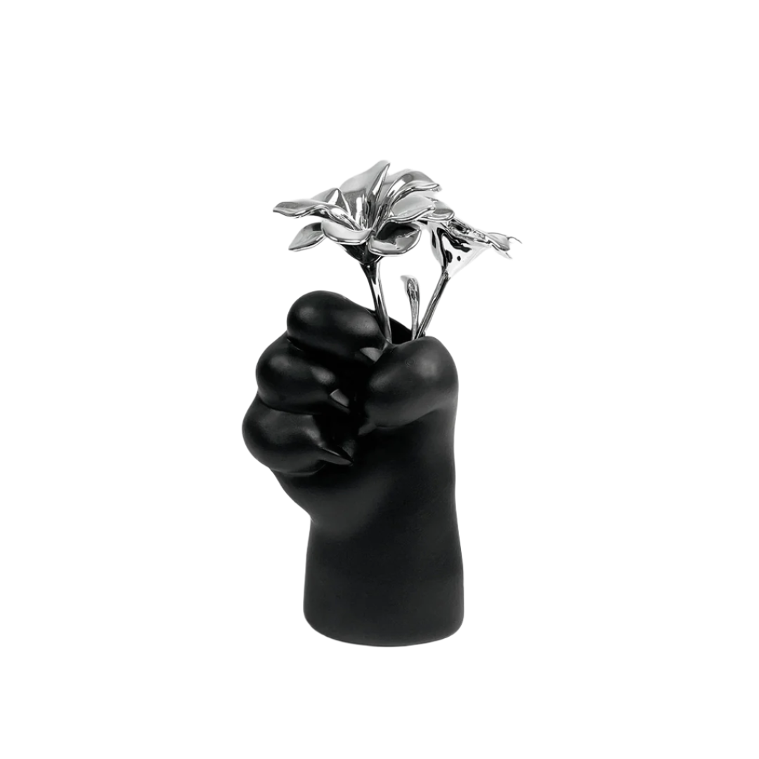 Futuristic chrome cat paw vase – sculptural paw-shaped metal vessel with smooth reflective finish, blending playful animal motif and minimalist design