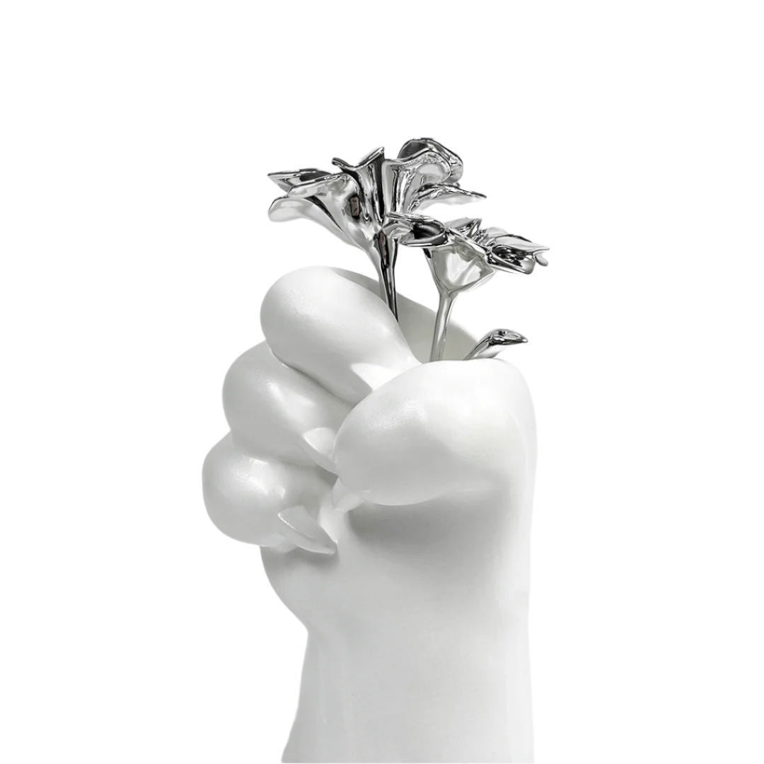 Futuristic chrome cat paw vase – sculptural paw-shaped metal vessel with smooth reflective finish, blending playful animal motif and minimalist design